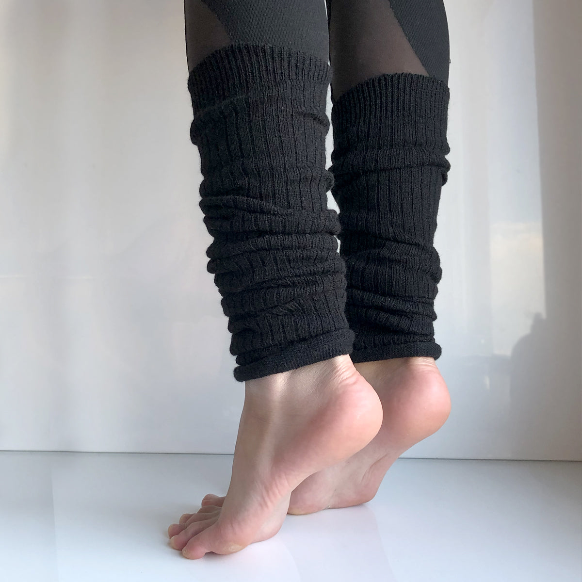 Sorte leggvarmere med ull - Lindex - "Leggings"